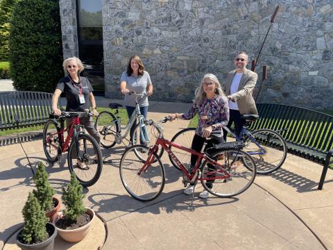 Pictured left to right: Comsewogue Public Library Director Debbie Engelhardt, Susan Guerin, Claudia Friszell, and Alex Blend